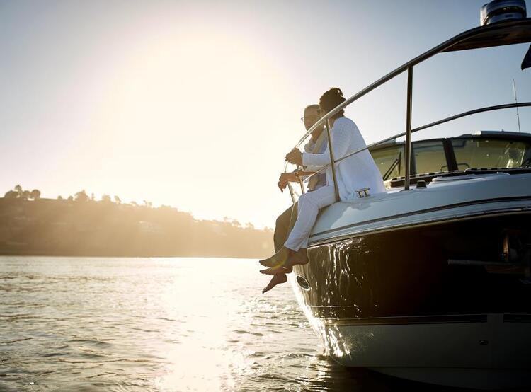 couple on boat at sunset